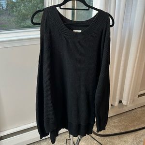 Shoulder showing sweater
